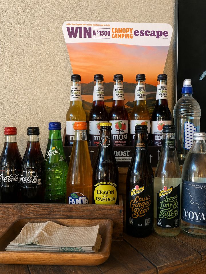 Bottled drinks arranged on a shelf at Me & You Cafe